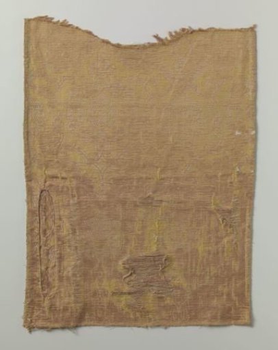 Fragment of yellow brocatelle with pointed ovals and stylized flowers
