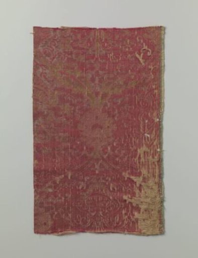 Fragment of red brocatelle with a pomegranate motif