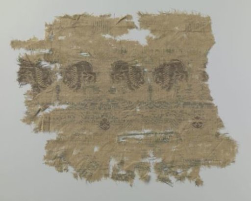 Fragment of a fabric decorated with lions and flowers
