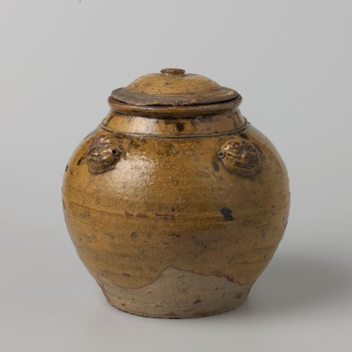 Ovoid covered jar with four moulded monster heads
