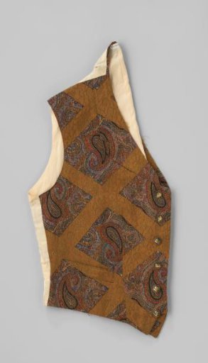 Jacket with three pockets, 6 black buttons with gold oriental scene and lapels of yellow-brown wool with woven flower and leaf motif and colored paisley motif within squares