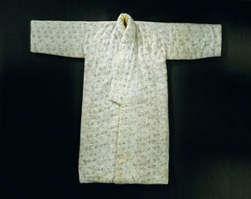 Japanese silk robe with a grey-blue ground featuring bundles and flowering branches in red with green and red with blue, stuffed with silk wadding and lined with yellow silk