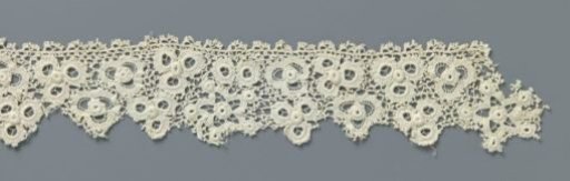 Strip of Crocheted Lace with Five-Pointed Stars and Flowers Made with Open Circles