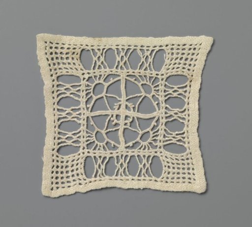 Doily of lace embroidery with rising suns along diamond shape