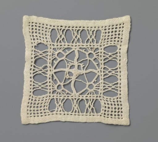 Doily of lace embroidery with rising suns along diamond shape