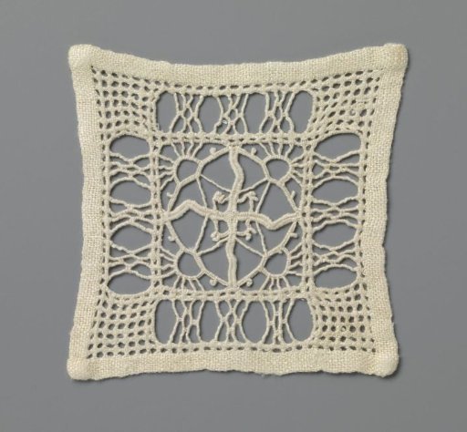 Lace garment with rising suns in a diamond pattern