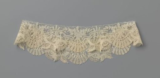 Standing collar of needle lace with scrolling ribbon