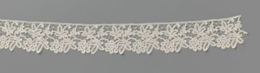 Strip of bobbin lace with grape clusters