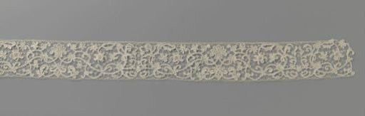 Strip of needle lace with interlacing vines