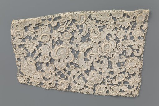 Vest of needle lace with twisted vine