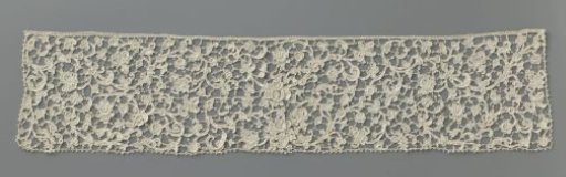 Jabot of needle lace with thin spiral tendrils