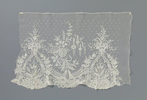 Sleeve of appliqué lace with pear-shaped medallions