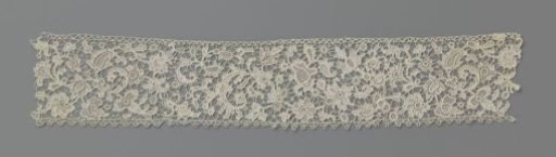 Strip of needle lace with feather motif