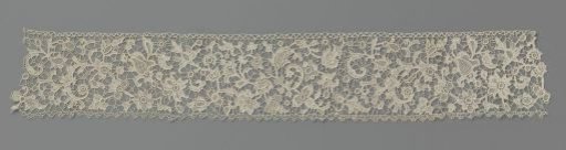 Strip of needle lace with feather motif