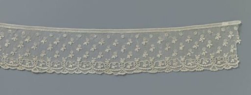 Strip of needle lace with falling blossoms
