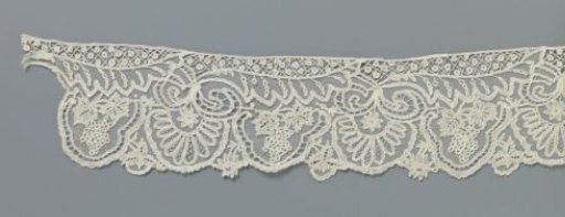 Strip of appliqué lace with grape clusters and halved leaves