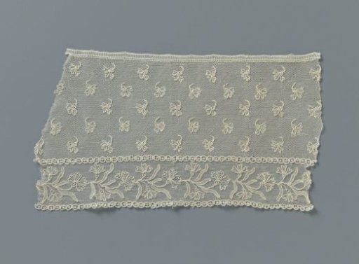 Strip of needle lace with cornflowers