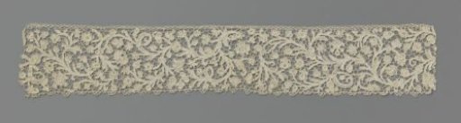 Strip of needle lace with plumed vines