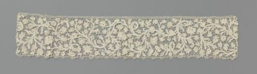 Strip of needle lace with plumed vines
