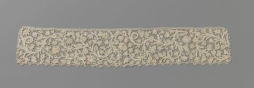 Strip of needle lace with plumed vines