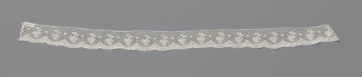 Strip of Bobbin Lace with Three Berries on a Branch