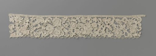 Strip of needle lace with snail shell