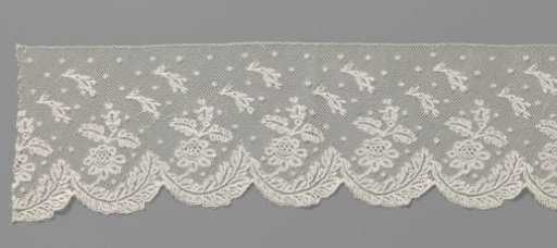 Strip of bobbin lace with anemones