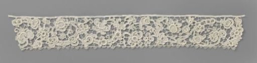Strip of needle lace with split spirals