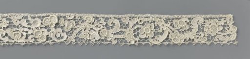 Strip of needle lace with hanging branch