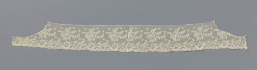 Strip of bobbin lace with horizontal flower sprigs