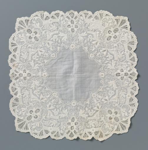 Handkerchief with a border of embroidery with eight rosettes