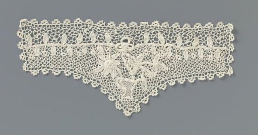 Cuff of crocheted lace with flower basket and bow