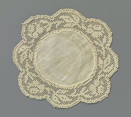 Round piece of batiste with filet border decorated with rose branches