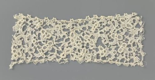 Strip of needle lace with bows and palmette flowers