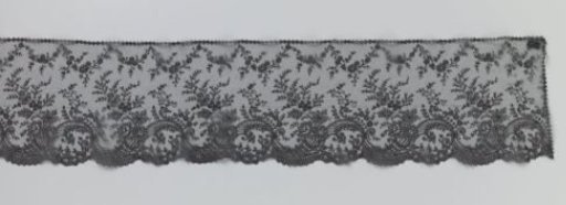 Strip of bobbin lace with the horns of plenty