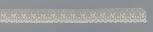 Strip of bobbin lace with 'earrings'