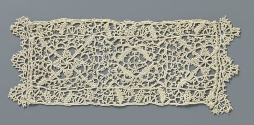 Strip of crocheted lace with reticella motifs