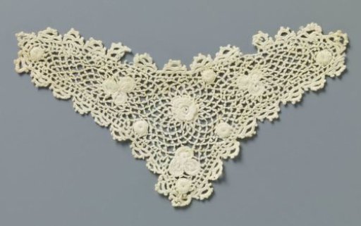 Insert of crocheted lace with rose and clover leaves