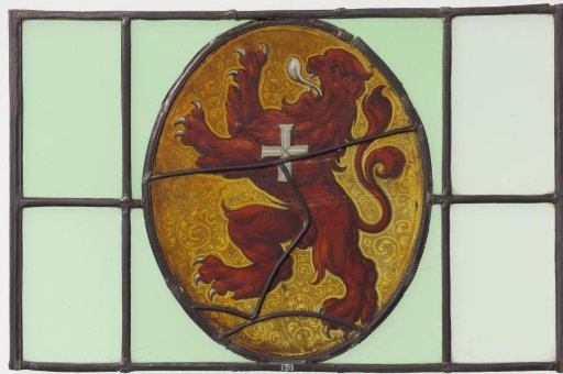 Window with climbing red lion with white cross on a gold field