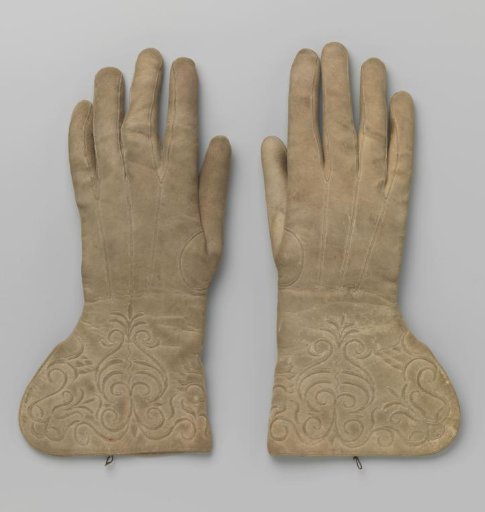 Gloves of beige felt. Decorated with a floral pattern on the cap