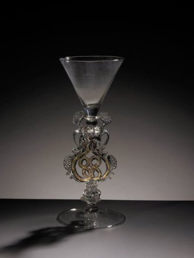 Winged glass with funnel-shaped bowl