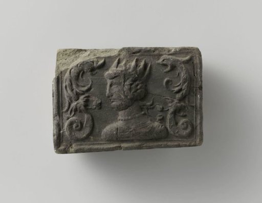 Fireplace stone with a representation of a Roman emperor