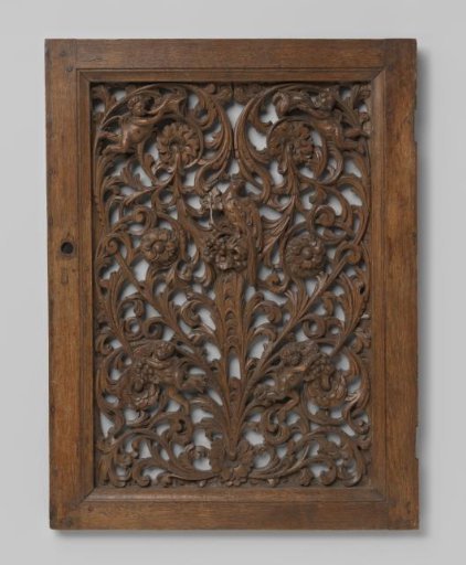 Panel with openwork symmetrical ornament of acanthus scrolls with flowers and putti and in the center an eagle on a flower