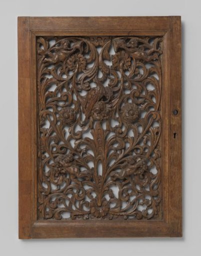 Panel with openwork symmetrical ornament of acanthus scrolls with flowers and putti and in the center an eagle on a flower