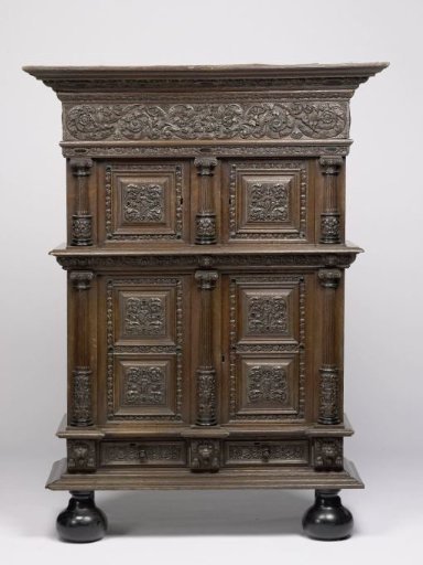 Cabinet with four doors with carved religious scenes