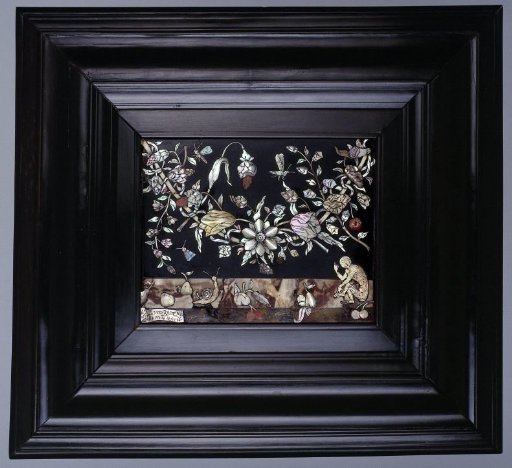 Panel with an inlaid representation of a tabletop with a monkey, a snail and fruits under a garland of flowers
