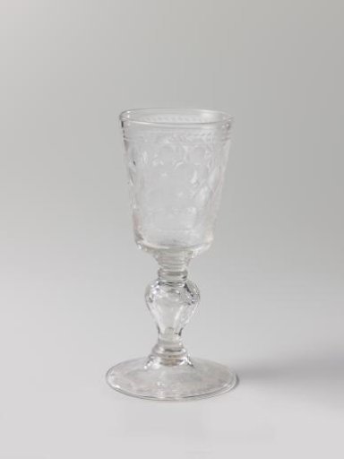 Chalice glass with sunflowers, leafy branches, and circles