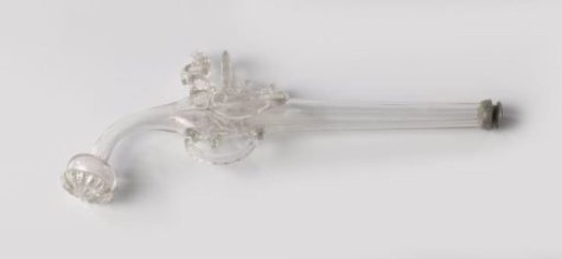 Glass in the shape of a pistol