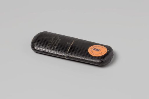 Spectacle case, elongated with rounded corners, covered with black checkered paper