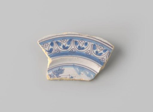 Sherd of reddish-firing earthenware, glazed white, with a painting of a landscape with a building and a border in blue on the front